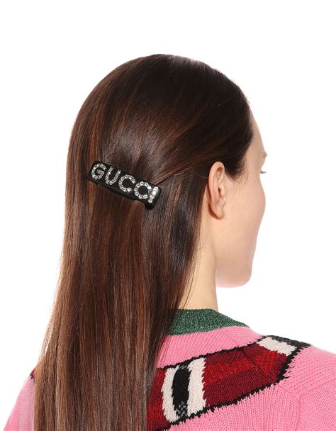 gucci hair clips.